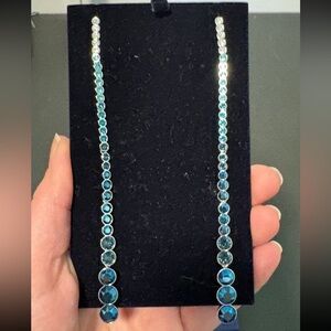 Swarovski Soroky Drop Earrings sapphire colored hombre NWB.